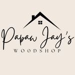 Logo for Papaw Jay's Woodshop with a stylized house on a beige background