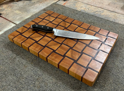 heirloom basket weave end grain cutting board on countertop