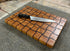 heirloom basket weave end grain cutting board on countertop